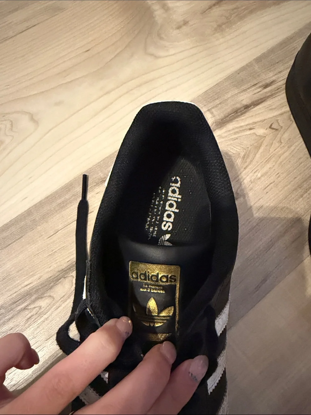 size 10 men’s adidas Superstar 'Core Black